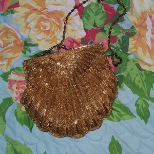 Gold beaded shoulder clutch